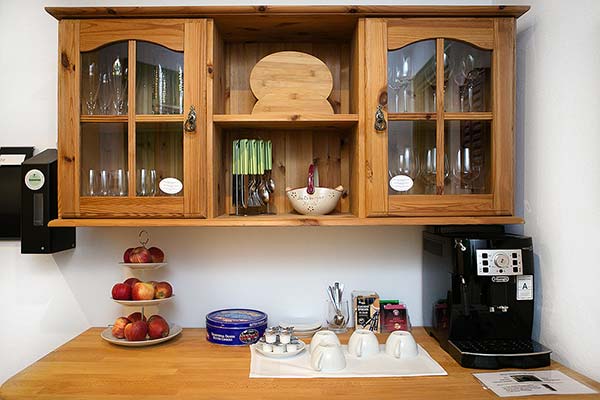 Our floor bar with coffee machine, cool drinks and fresh apples